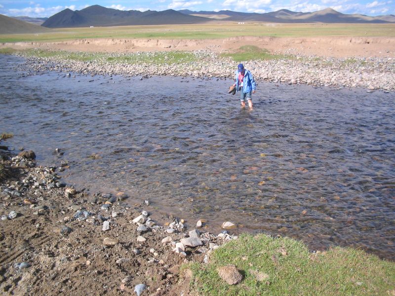Day 2: Kris crossing the river on foot