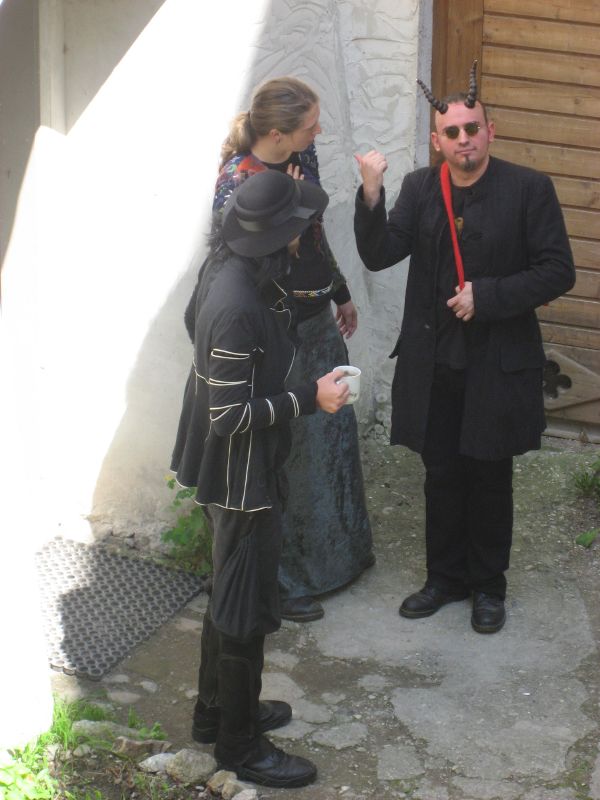The Priestess of Nasn is questioned by Recruit Pressfleisch