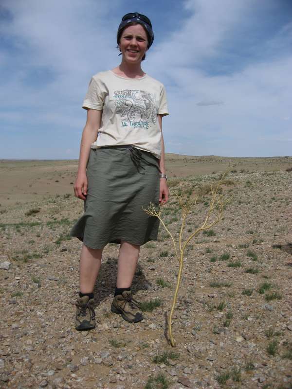 Christa next to a small tree