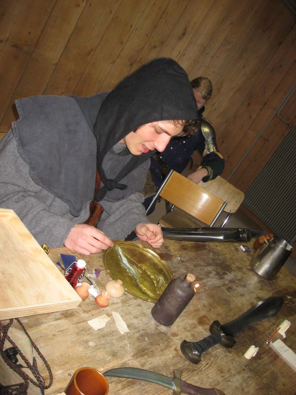 The magician blesses our weapons