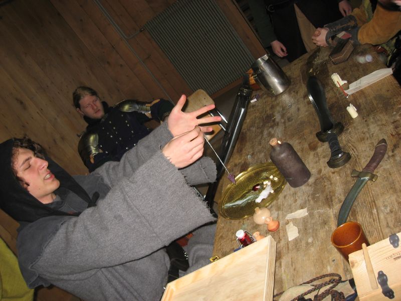 The magician blesses our weapons