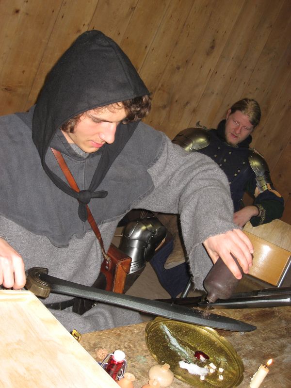 The magician blesses our weapons
