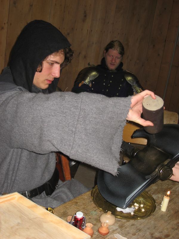 The magician blesses our weapons