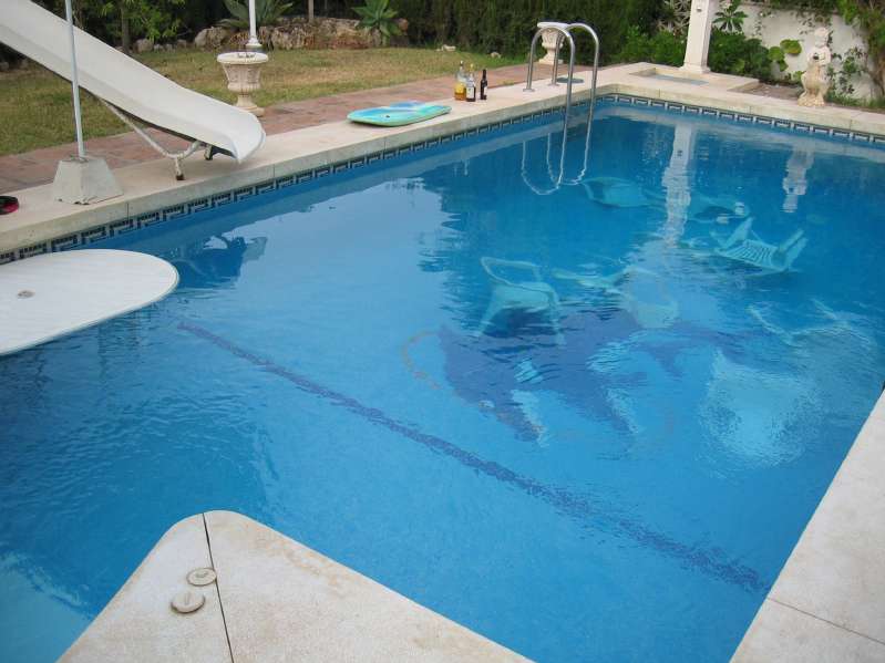 Chairs in the Pool